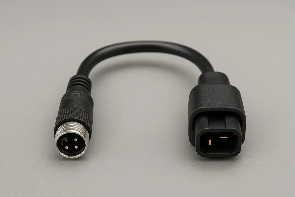 An adapter harness connecting a new AHD camera to an RV's pre-installed Furrion wiring